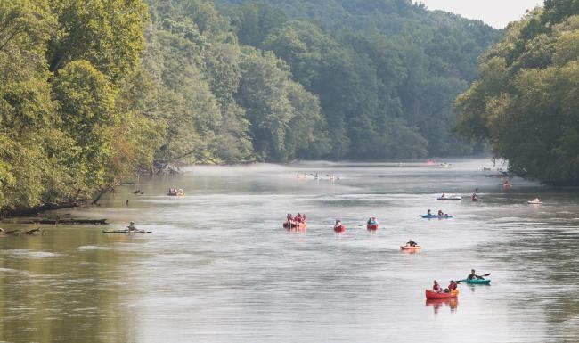 a group of people in a lake