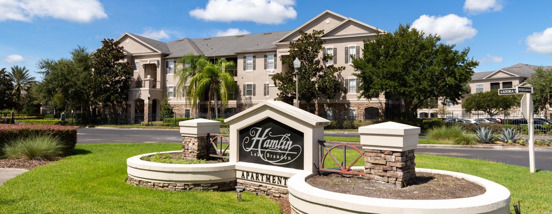 a large building with a sign in front of it