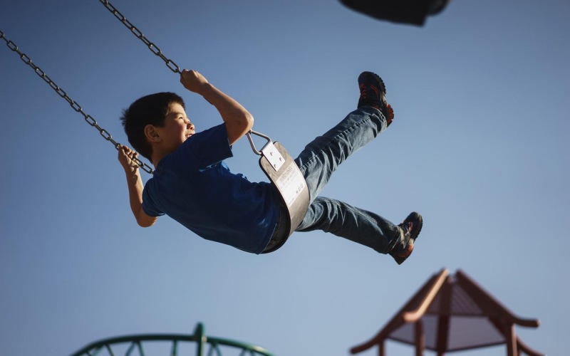 a boy on a swing