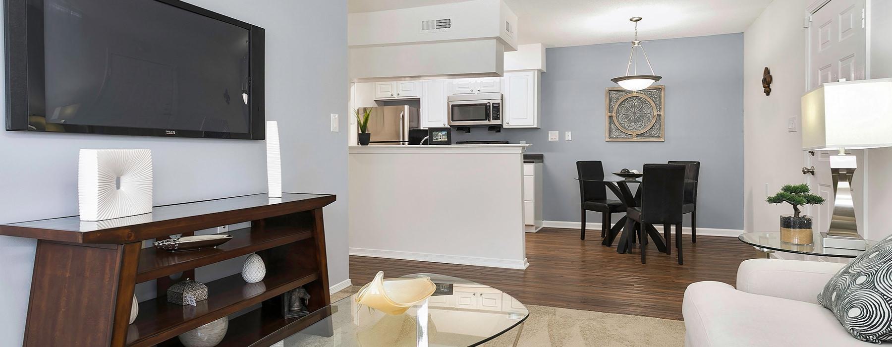 a living room with a tv and a couch