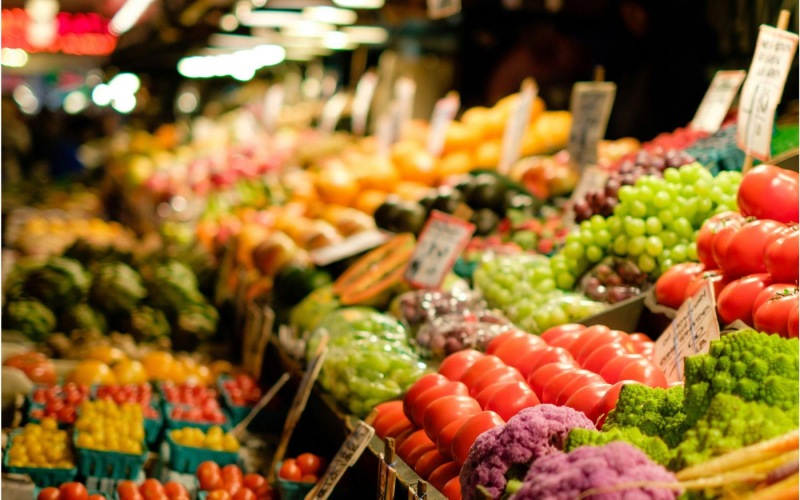 a market with vegetables and fruits
