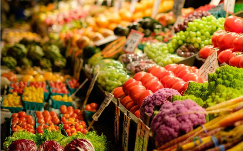 a market with vegetables and fruits