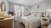 Bedroom with lots of natural light and large closets