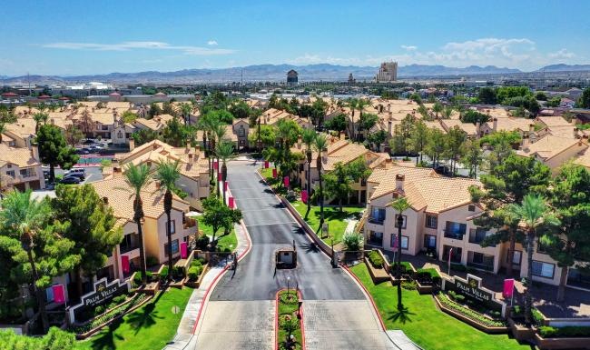 a street with buildings and trees
