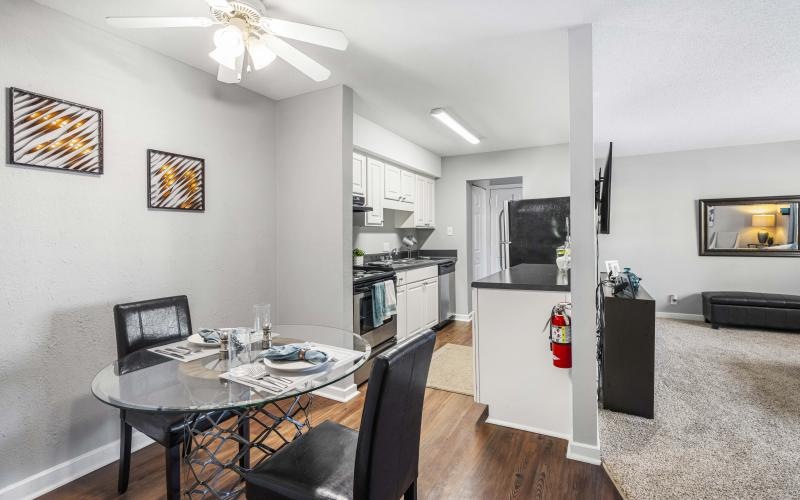 a kitchen with a dining table