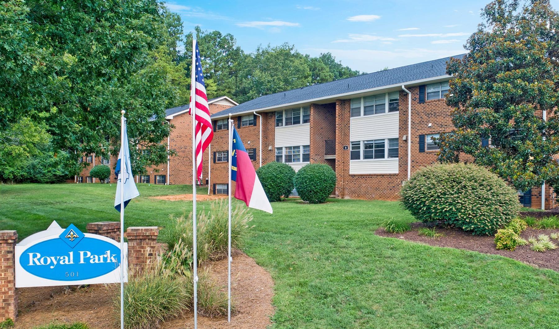 a building with flags in front of it
