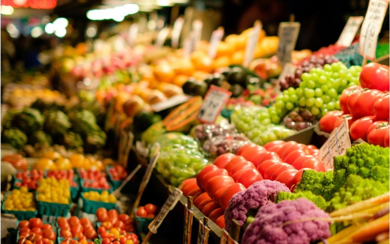 a market with vegetables and fruits