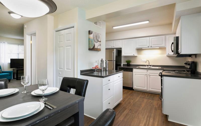 a kitchen with a dining table