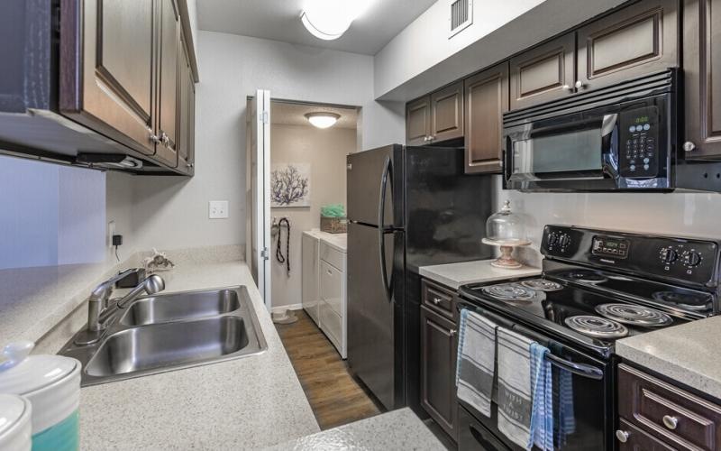 a kitchen with stainless steel appliances
