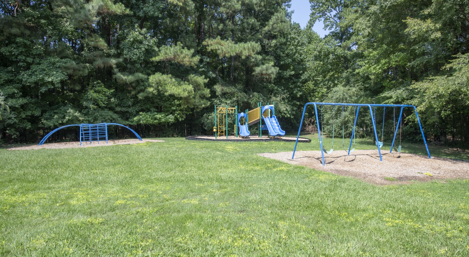 Dynamic outdoor play space complete with varied activity stations