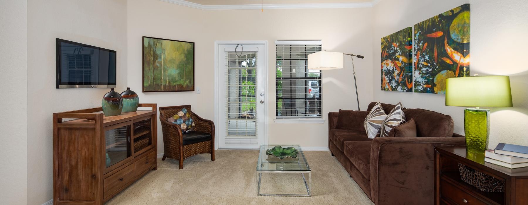 a living room with a couch and a table