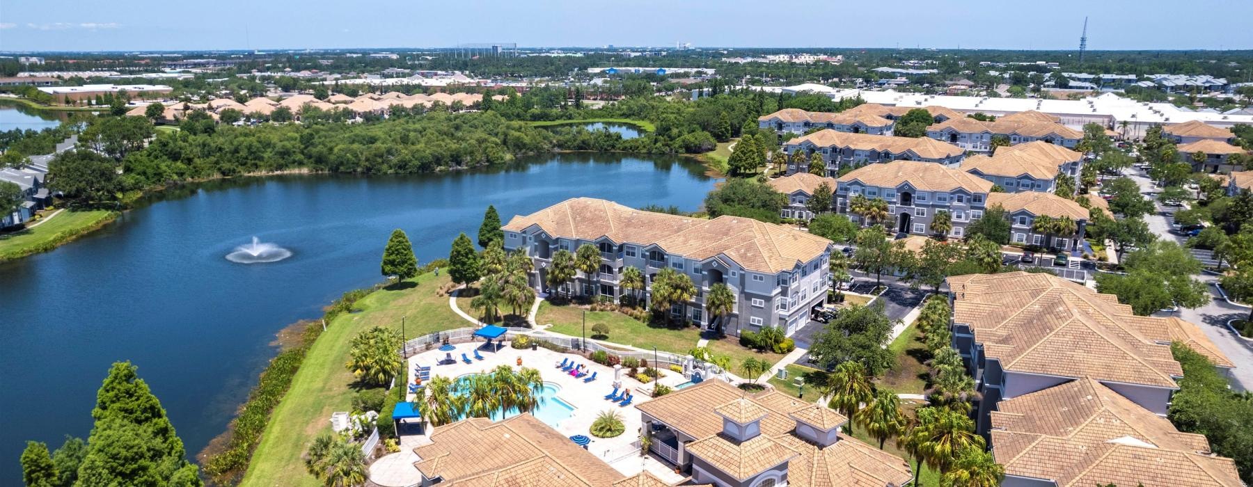 a large building next to a body of water