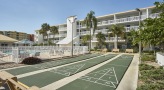 Shuffle board courts next to swimming pool