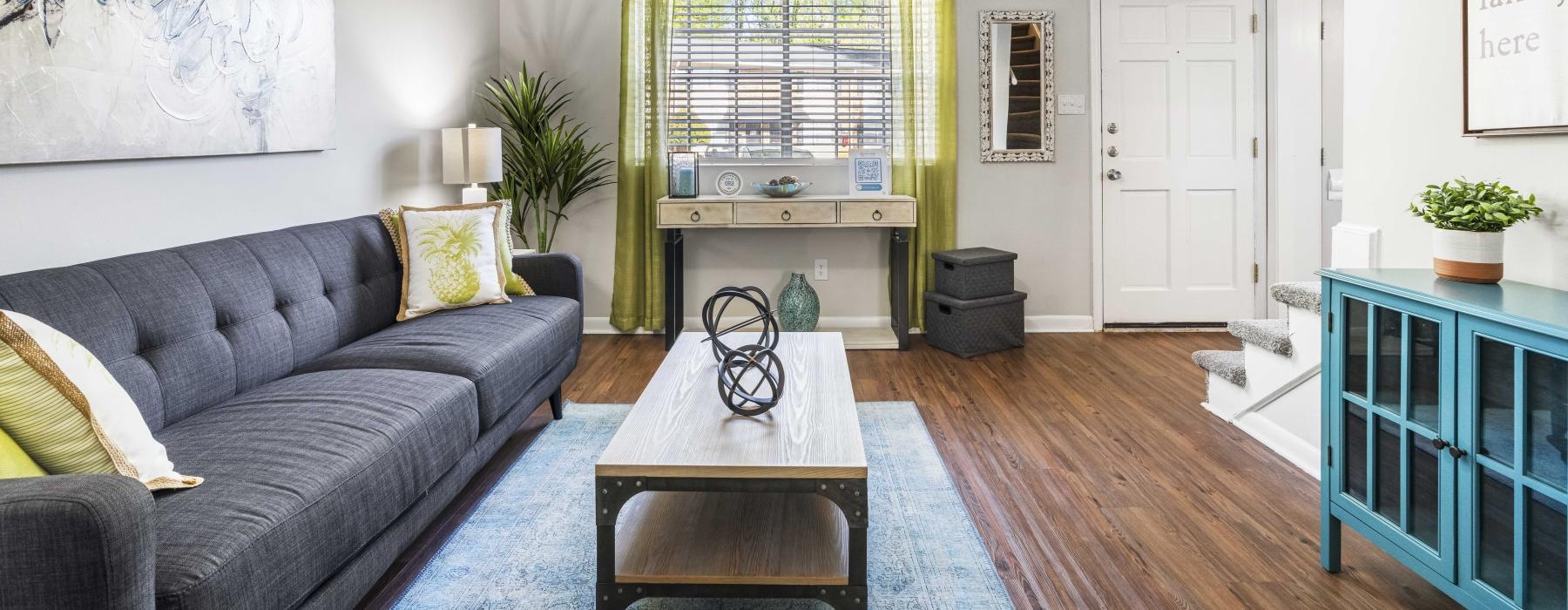 a living room with a couch and a coffee table