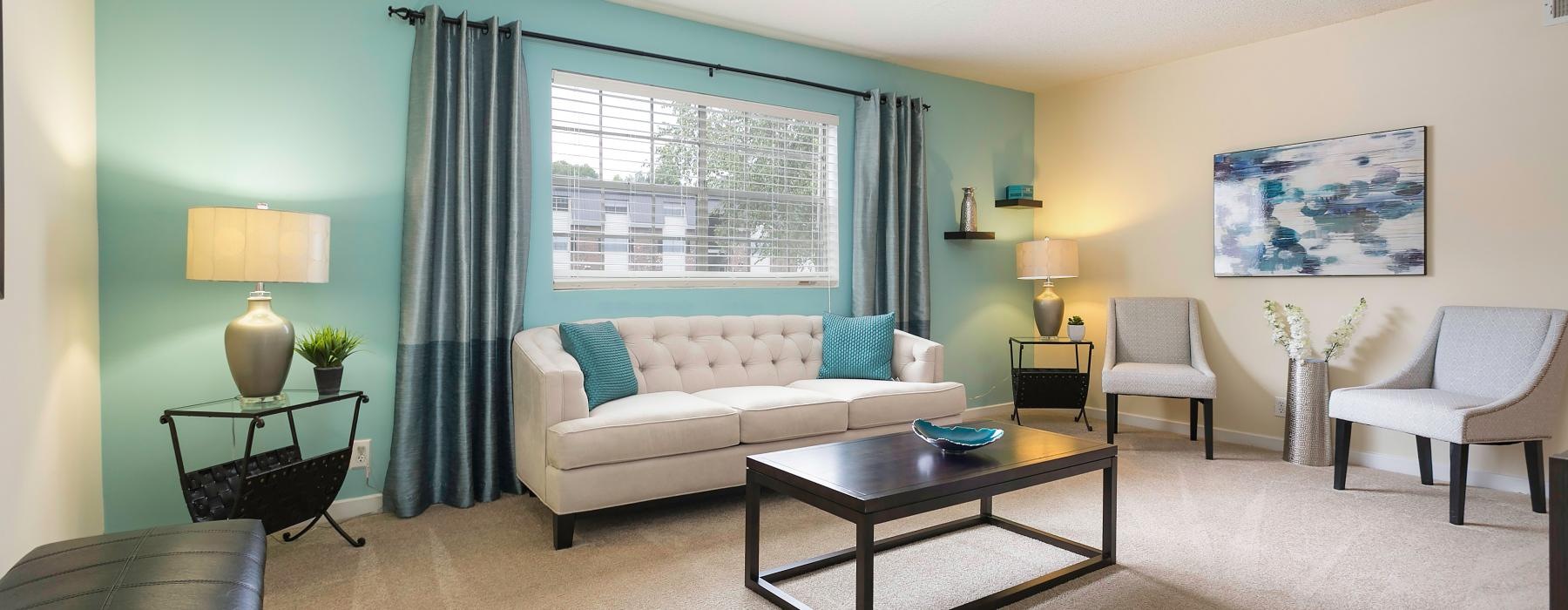 a living room with a couch and a coffee table