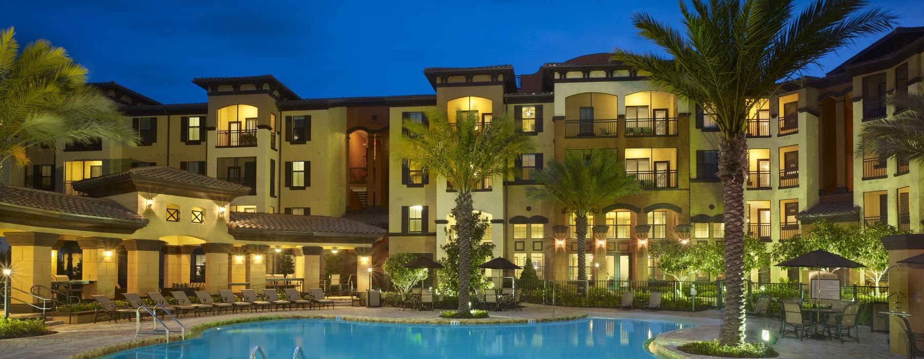 a pool in front of a building