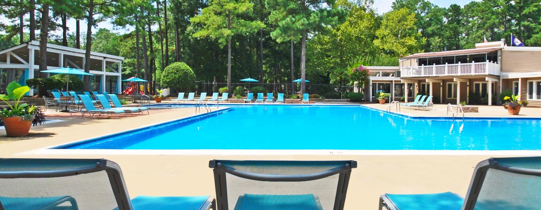 lounge chairs looking toward pool