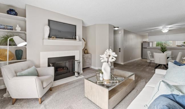 a living room with a fireplace