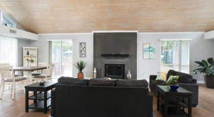 Resident clubhouse with wood floors and lounge seating