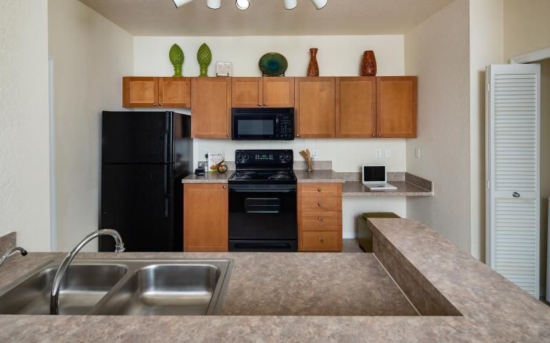 a kitchen with a marble countertop