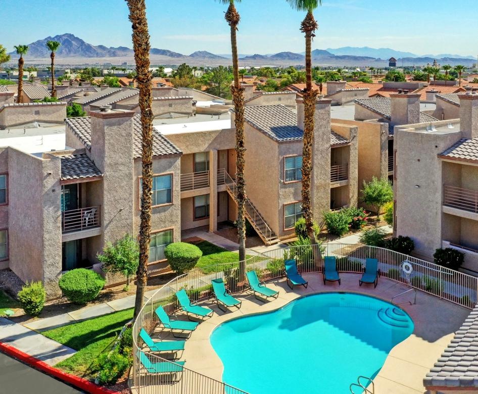 a pool surrounded by buildings