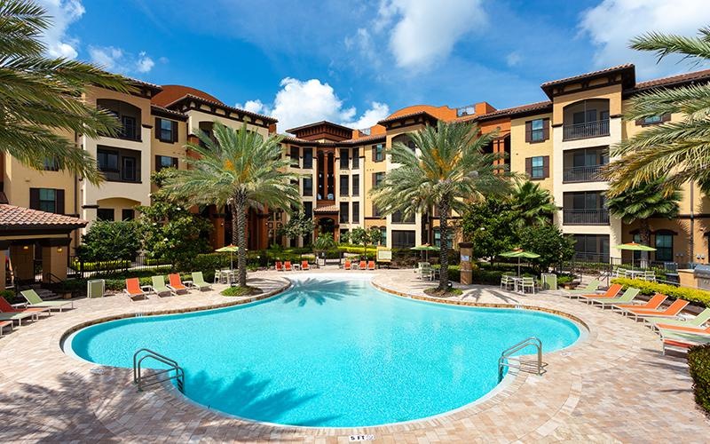 a pool in front of a building