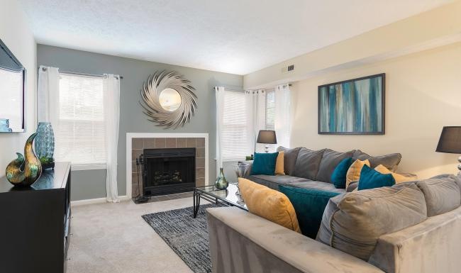 a living room with a fireplace