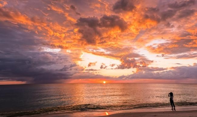 a person standing on a beach