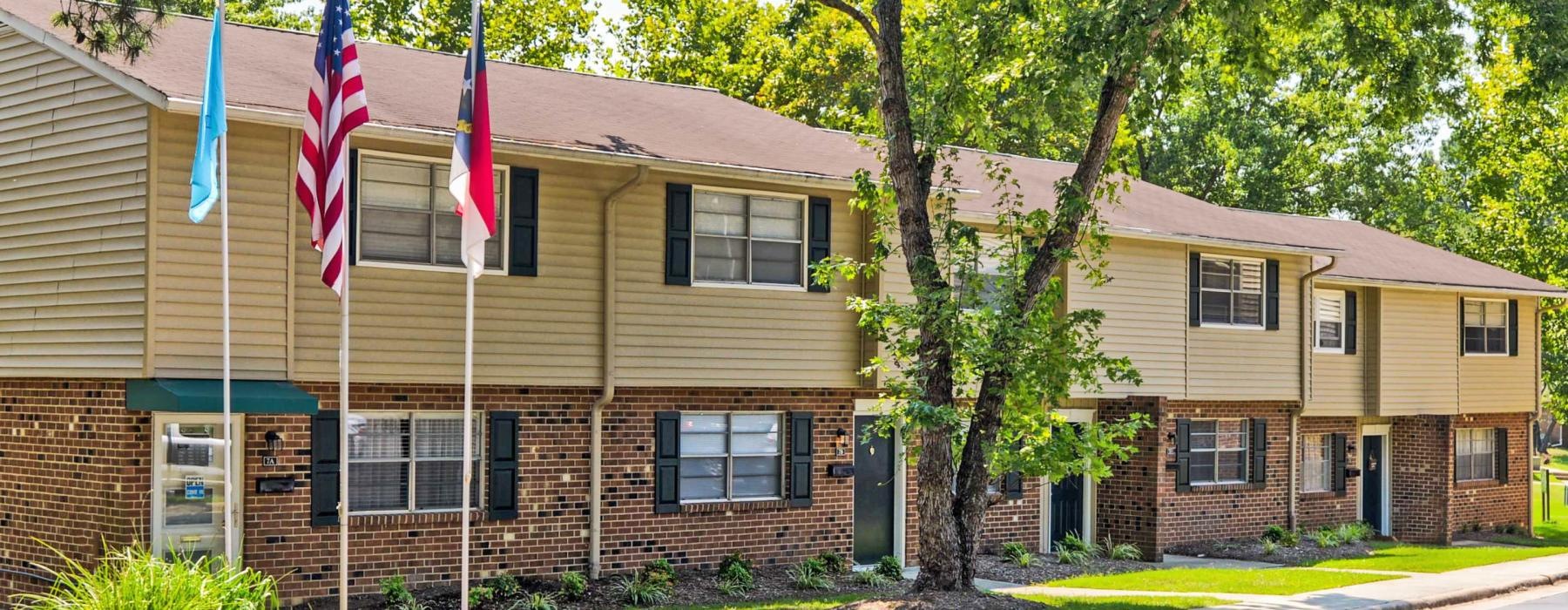 a building with flags on the front