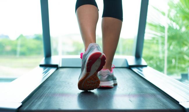 a personn walking on a treadmill