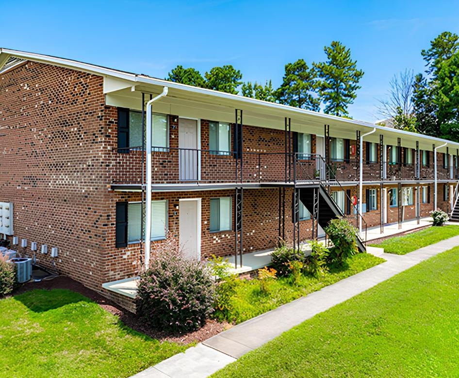 a brick house with a driveway
