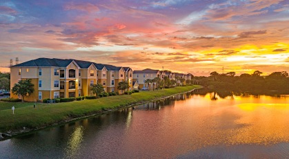 Colorful sunset over Aluna Largo and private lake