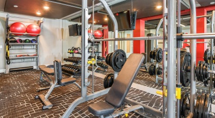 Fitness center with free weights and weight training equipment 