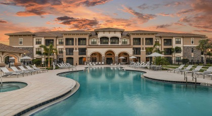 Resort-style pool with lounge seating