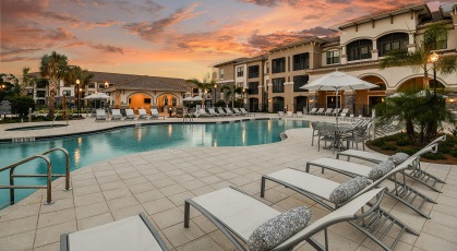 Resort-style pool with lounge seating