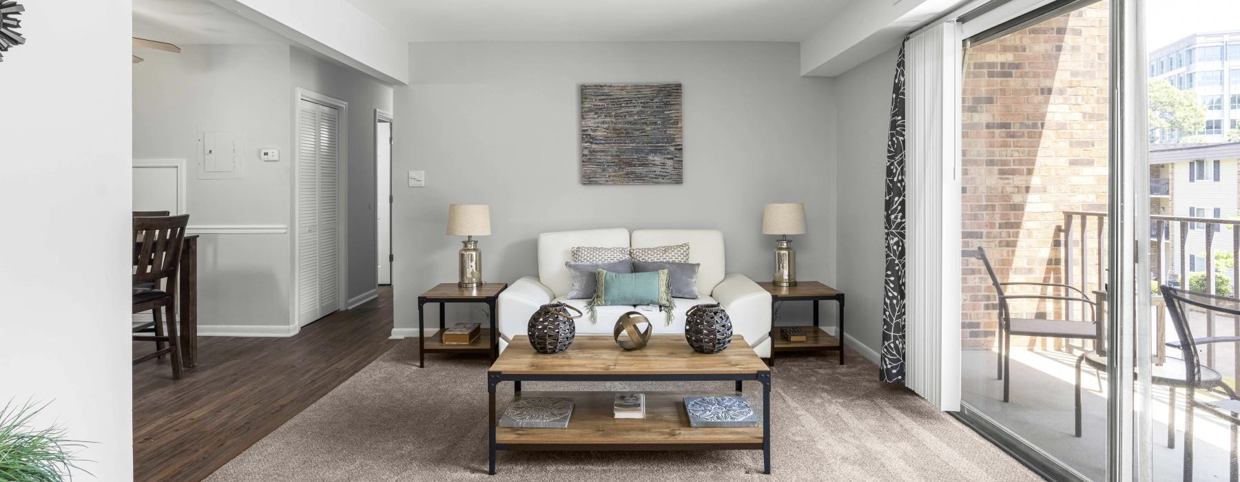 a living room with a couch and coffee table