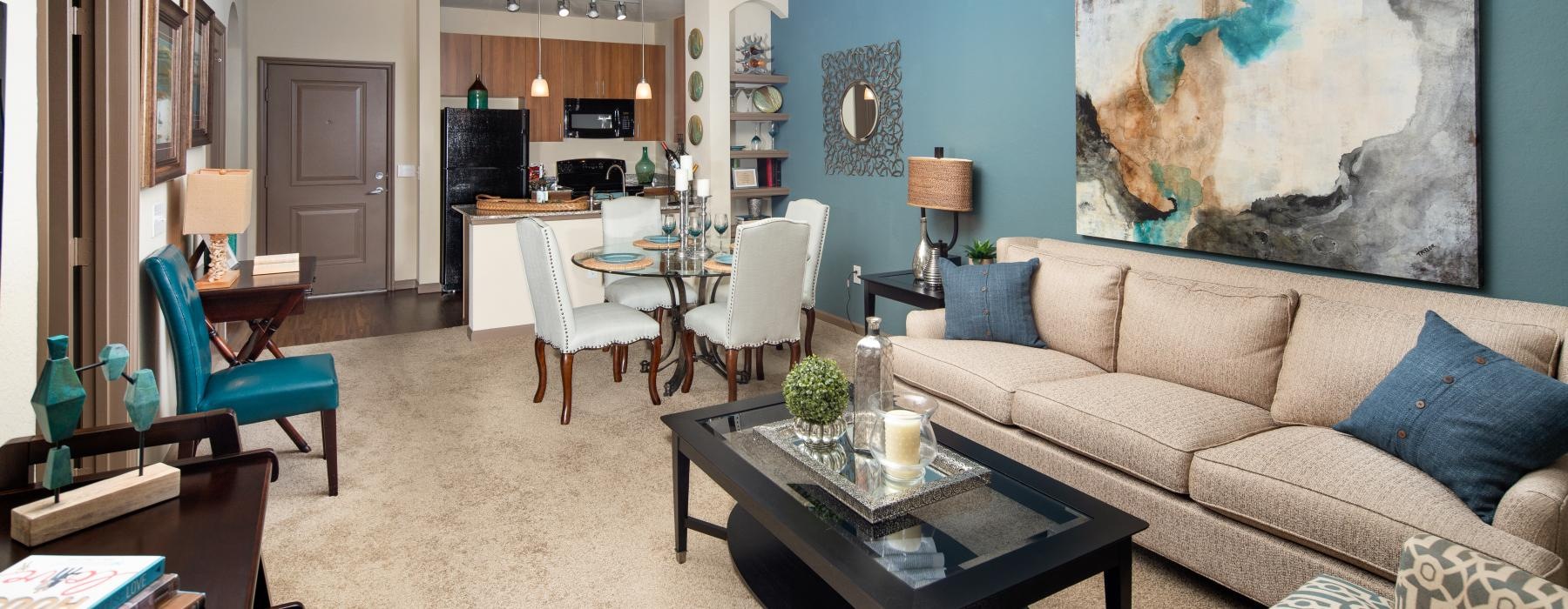 a living room with a couch and a table