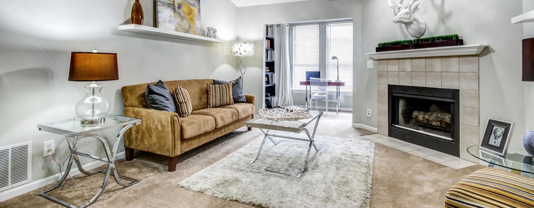 a living room with a fireplace