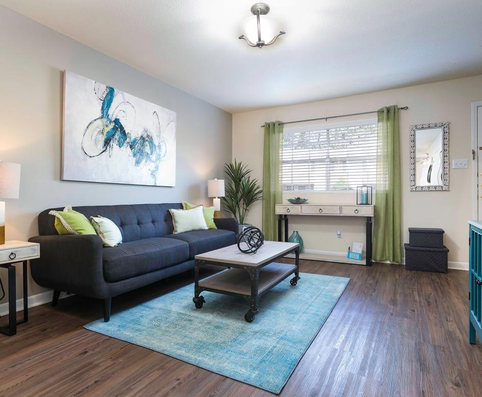 a living room with a couch and a coffee table