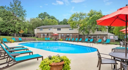 Pool with lounge chairs and umbrellas