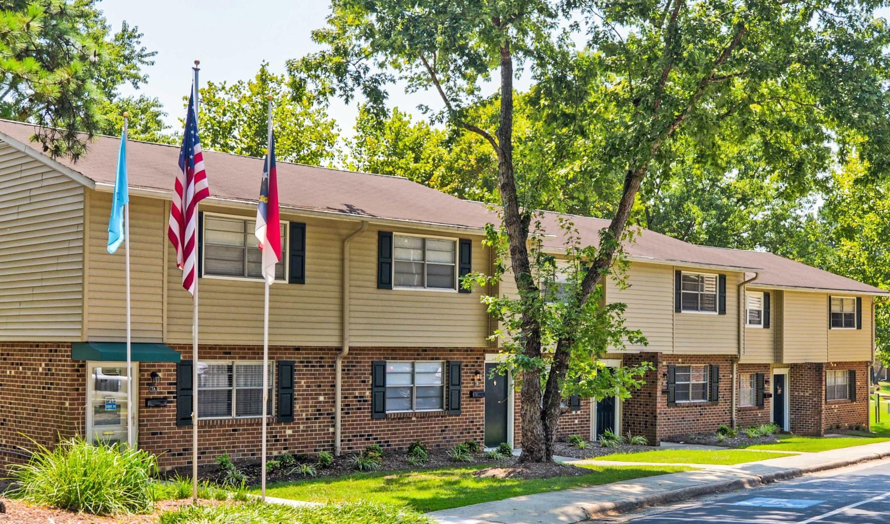 a building with flags on the front