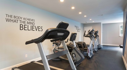 Fitness Center with treadmills and free weights 