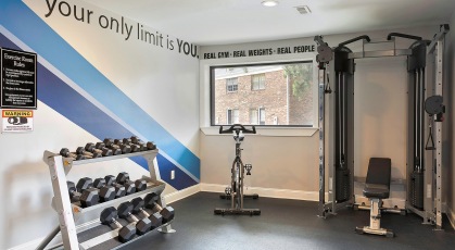 Fitness Center with treadmills and free weights 