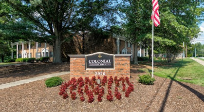 Colonial Townhouse Apartments entrance community signage