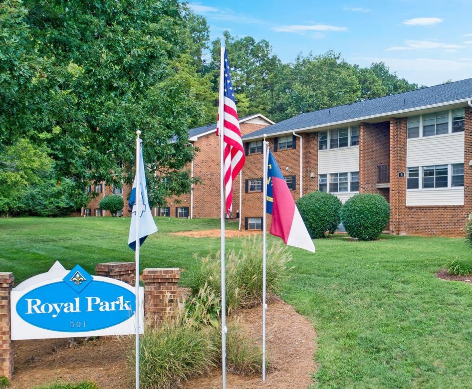 a building with flags in front of it
