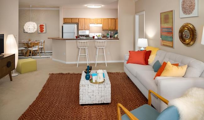 a living room with a couch and a table