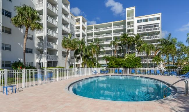 a pool in front of a building
