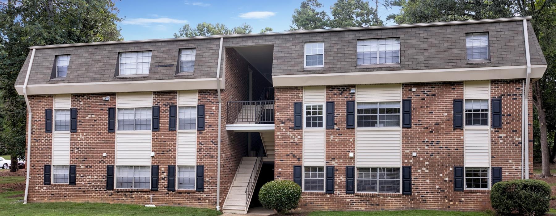 a brick building with a staircase