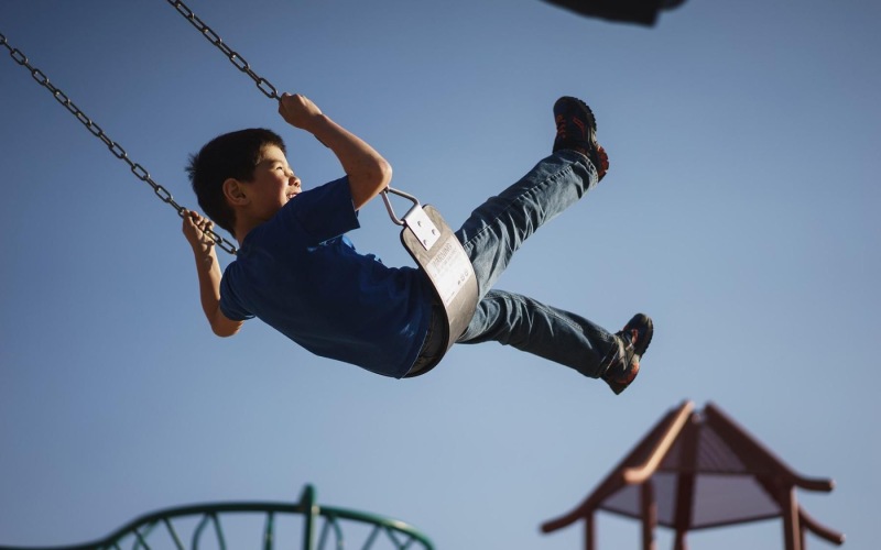 a boy on a swing