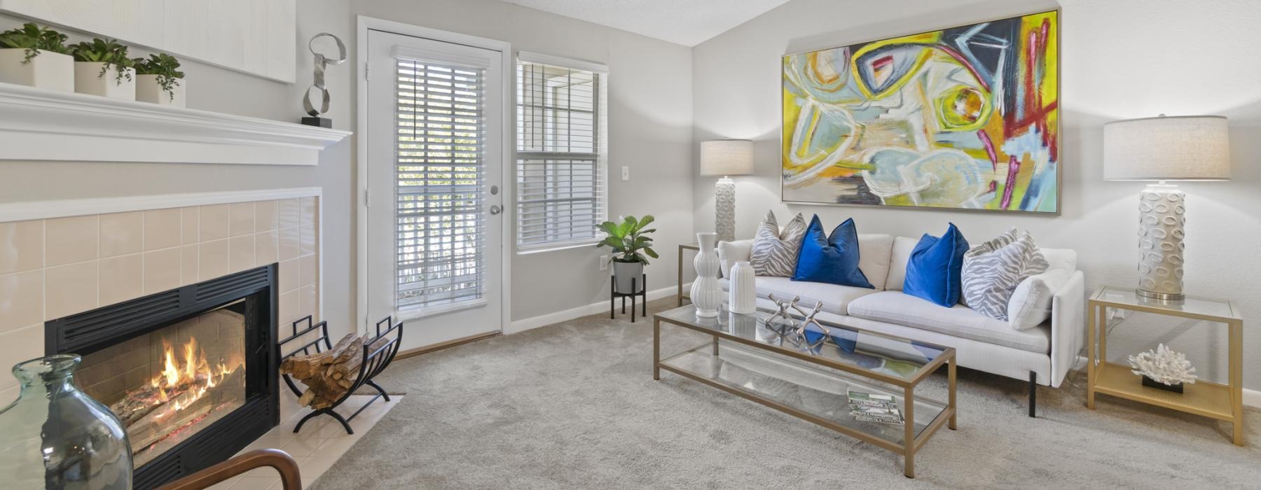 a living room with a fireplace